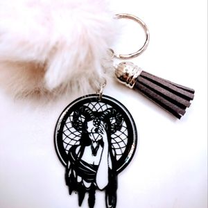 The creature dreams Keychain With Tassel And Fur.